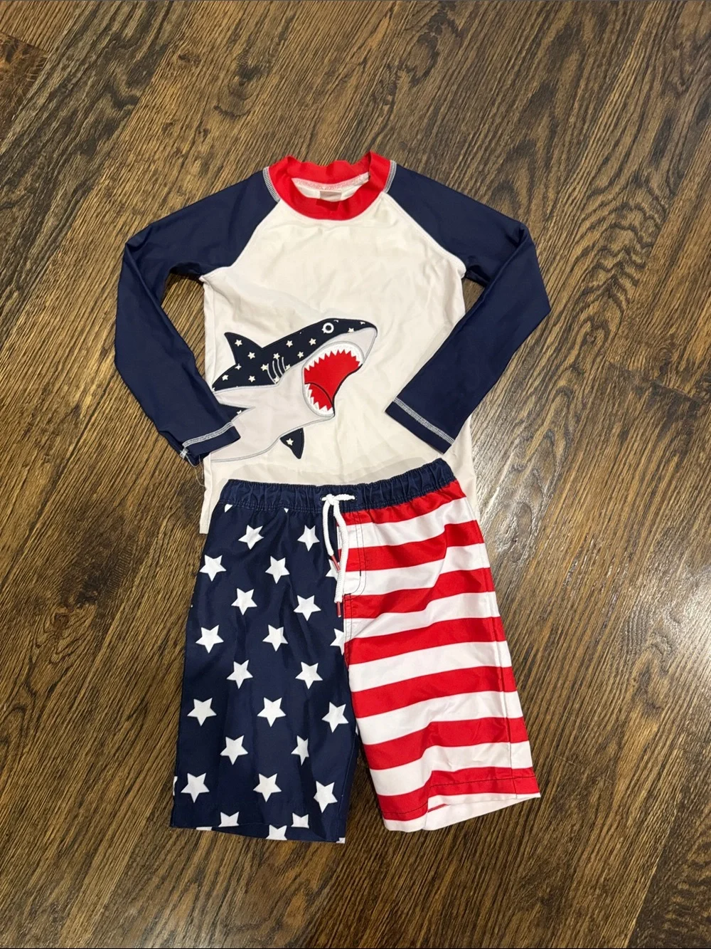 Patriotic shark swim trunks and rash guard